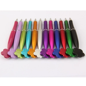 Set of 12 colorful ballpoint pens with unique plum blossom flower caps on white background
