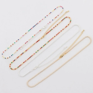 Detailed view of four multi-color and white zircon necklaces with lobster clasps