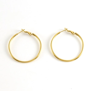 Detailed view of polished 18K gold-plated stainless steel hoop earrings with lever-back closure