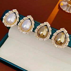 Exquisite hollow teardrop pearl earrings with sparkling zircon inlay for women