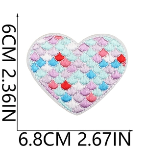 Detailed size view of heart-shaped mermaid scale embroidery patch with clear stitching