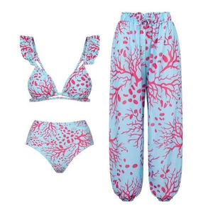 Detailed flat lay of a blue three-piece floral bikini set with high-waist drawstring pants
