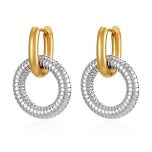 Detail of two-tone gold and silver linked hoop earrings with polished and textured finish