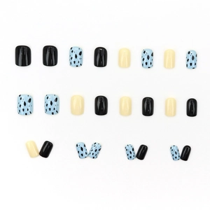 Short square press-on nails in black, cream, and blue spotted patterns set of 24 pieces
