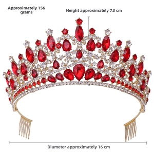 Detailed view of luxury red rhinestone bridal crown with gold metal base and side combs