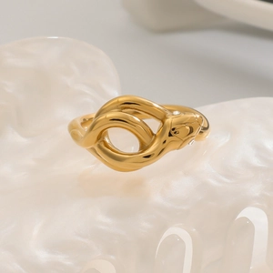 Elegant gold snake-shaped ring in polished stainless steel with crystal accents