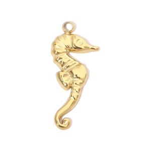 Close-up of golden seahorse pendant in stainless steel with high-gloss polished finish