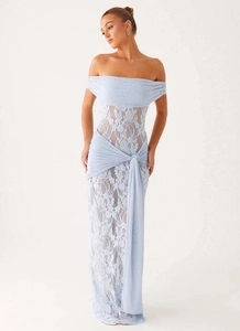 Detail of light blue lace off-shoulder maxi dress with elegant waist tie and sheer fabric