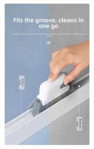 Detail of 2-in-1 window groove cleaning brush with scouring pad in aluminum track