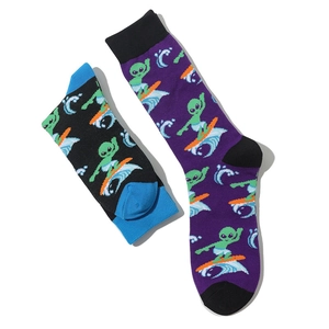 Purple and black cotton crew socks featuring green surfing alien patterns for men and women