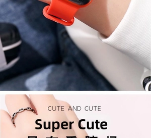 Detail of bright orange silicone watch band and silver chain ring in anchor link style