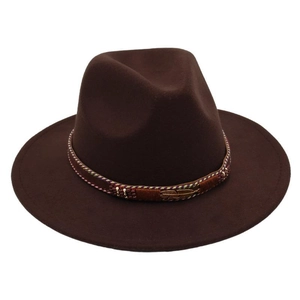 Close-up of brown wool fedora with rainbow beaded band and golden feather charm