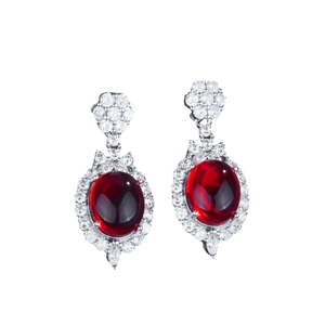 Luxurious ruby red oval stud earrings with sparkling white cubic zirconia clusters