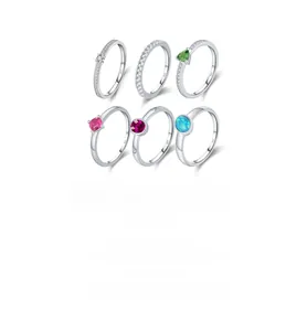 Collection of S925 silver rings featuring vibrant oval lab-grown opals and gemstones