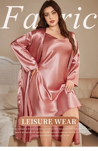 Detail of luxury satin sleepwear set with silk-like texture and elegant lace V-neckline