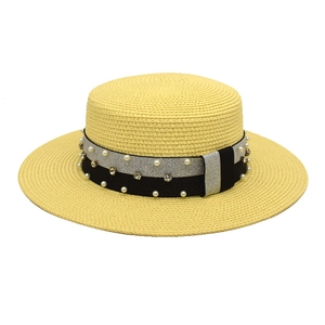Yellow wide brim straw hat with pearl and rhinestone band for summer sun protection
