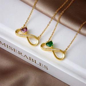 Elegante gouden titanium stalen ketting met oneindig hart hangers en paarse en groene stenen