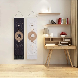 Bohemian tapestry set with sun moon and eye patterns on beige wall background