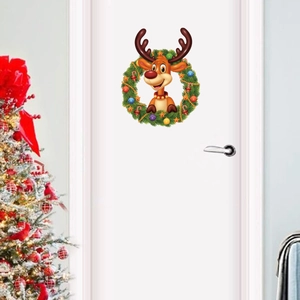 Christmas reindeer wreath door sticker with festive ornaments on a white door