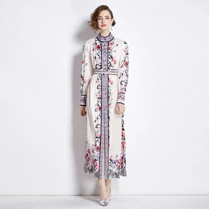 Floral print long sleeve dress with stand collar and waist tie on a white background