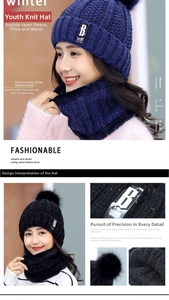 Close-up of winter knit beanie and neck warmer set with faux fur pom and thick fleece lining