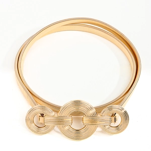 Eleganter goldener Metall-Federgürtel für Damen mit dreifachem Rundschnallen-Design