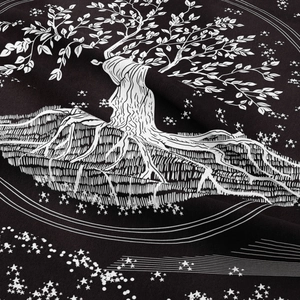 Detailed close-up showing the fine fabric texture and Tree of Life print on the black tapestry