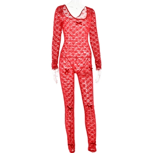 Detail of red lace bodysuit with long sleeves and multiple decorative ribbon bows