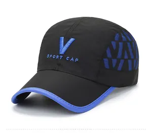 Detailed close-up of V-letter embroidery and quick-dry mesh texture on black sports cap