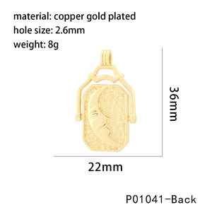 Back view of a gold-plated copper moon pendant with relief carving and 36mm size