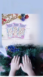 Luminous Christmas nail stickers for kids featuring Santa and reindeer designs