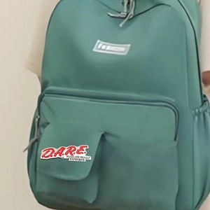 Morandi green D.A.R.E. creative letter patches backpack with functional front pockets