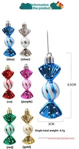 Detail of multi-colored candy shaped Christmas tree ornaments with glitter finish