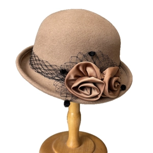 Elegant camel wool cloche hat for women with mesh veil, satin roses and velvet balls