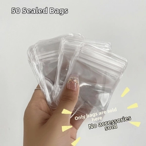 Detailed view of clear PVC jewelry storage bags showing high transparency and seal