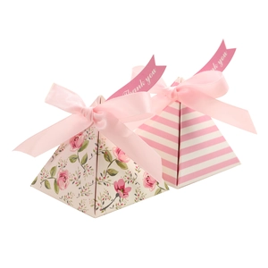 Pink pyramid floral candy box with ribbon for wedding favors and party gift packaging