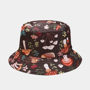Close-up of brown bucket hat featuring colorful cartoon mushroom and floral patterns