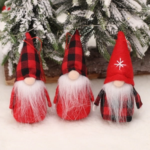 Set of 3 Christmas gnome ornaments with red and black plaid hats and white beard on a snow tree
