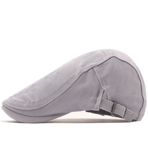 Detail of light grey mesh trucker hat with breathable fabric and adjustable metal buckle