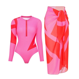 Pink and red geometric print long sleeve one-piece swimsuit with matching wrap skirt
