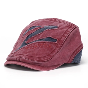 Macro detail of washed cotton ivy cap with Boston embroidery and distressed finish