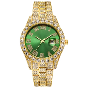 Detail of gold hip hop watch with green Roman dial and crystal-encrusted bezel