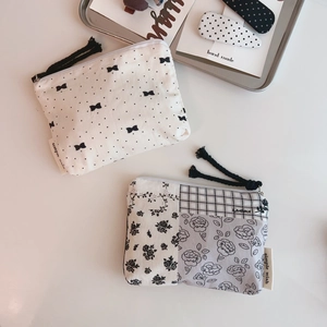 Minimalist cotton floral storage pouches with polka dots and simple wish brand label