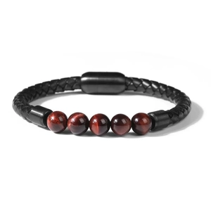 Detail of 8mm tiger eye beads and black braided leather rope with magnetic clasp