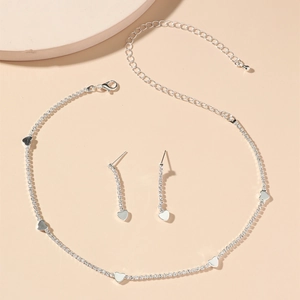 Elegant silver rhinestone necklace and heart earrings set for bridal fashion