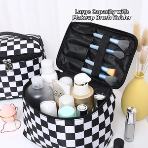 Detail of checkered makeup bag with large main compartment and brush holder slots