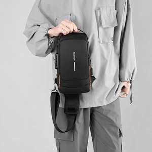 Detail of black waterproof chest bag with side digital anti-theft combination lock