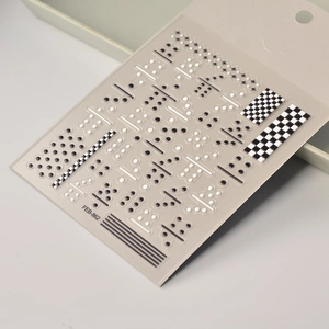 Detailed macro of 5D embossed nail stickers FEB-862 with black and white checkerboard pattern