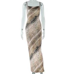 Detail showing the brown snakeskin print and slim fit cut of this sleeveless maxi dress