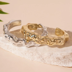 Minimalist metallic fold textured irregular open bangles in gold and silver finish